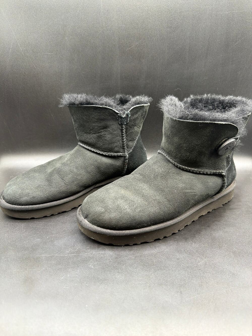 UGG Mini Bailey Button II Black Sheepskin Boots Women’s Size 9 1016422